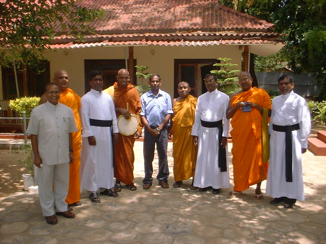 Group photo with Daya Master and other priests in Kilinochchi office May 2006 -.JPG